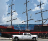 Photo by H.S. Cooper © Chevy and pirate ship (AL)